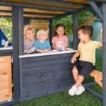 KidKraft Cozy Escape Outdoor Play Tower, Tube Slide, Wooden Climbing Frame - Image 6