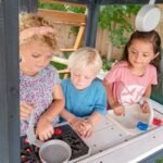 KidKraft Cozy Escape Outdoor Play Tower, Tube Slide, Wooden Climbing Frame - Image 7